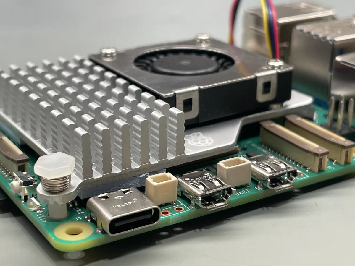 A close-up photo of the Raspberry Pi 5, showing its mounted Active Cooler.