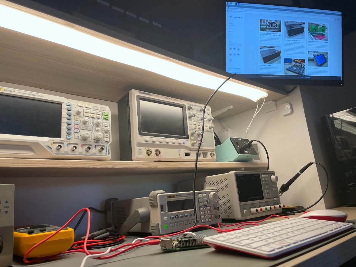 A shot of an electronics laboratory with a Raspberry Pi board used as a desktop computer.