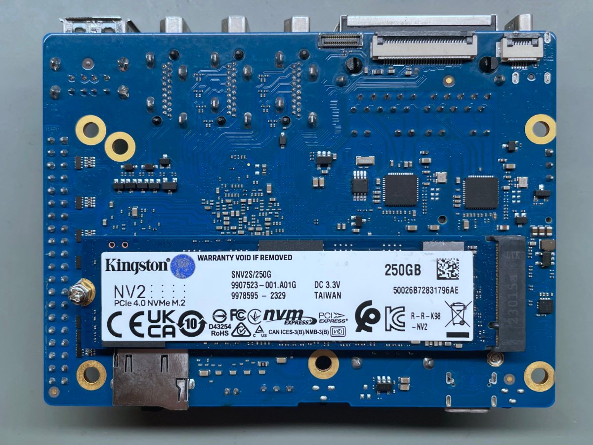 A bottom-side shot of the board with an NVMe SSD mounted.