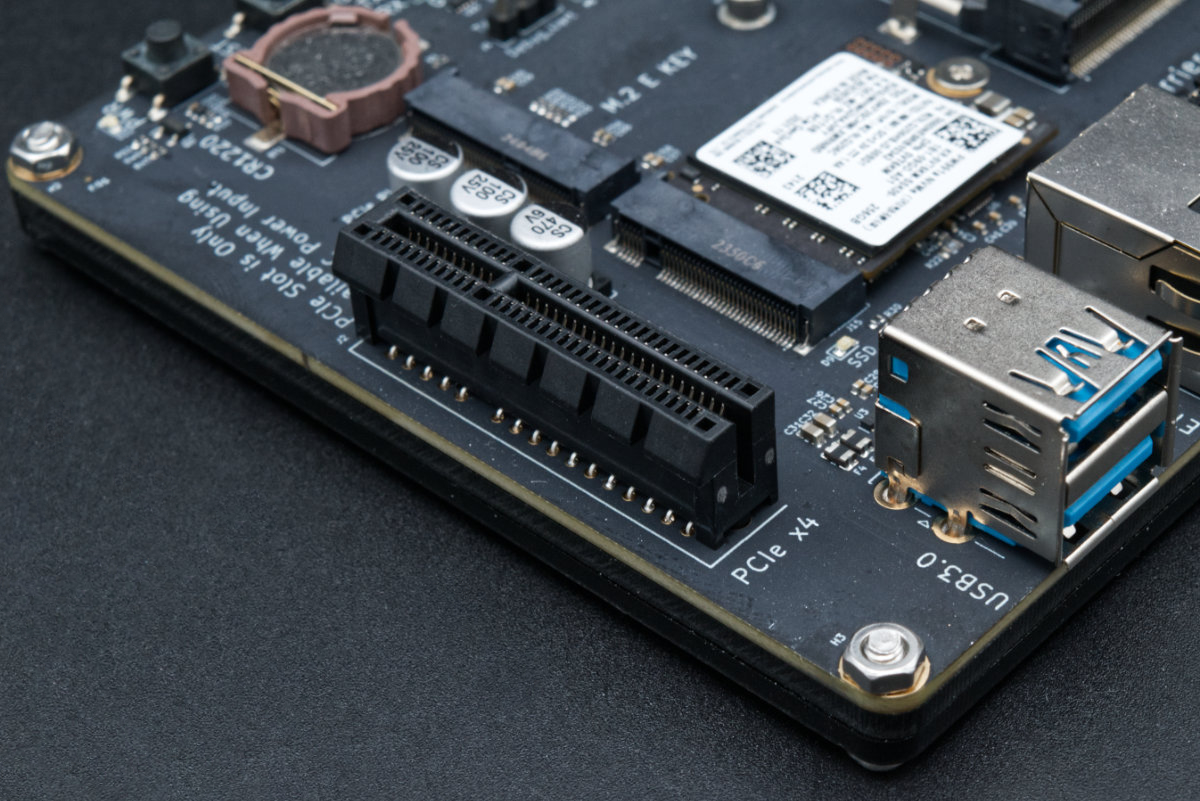 A close-up photo showing the PCIe x4 connector on the LattePanda Mu lite carrier board.