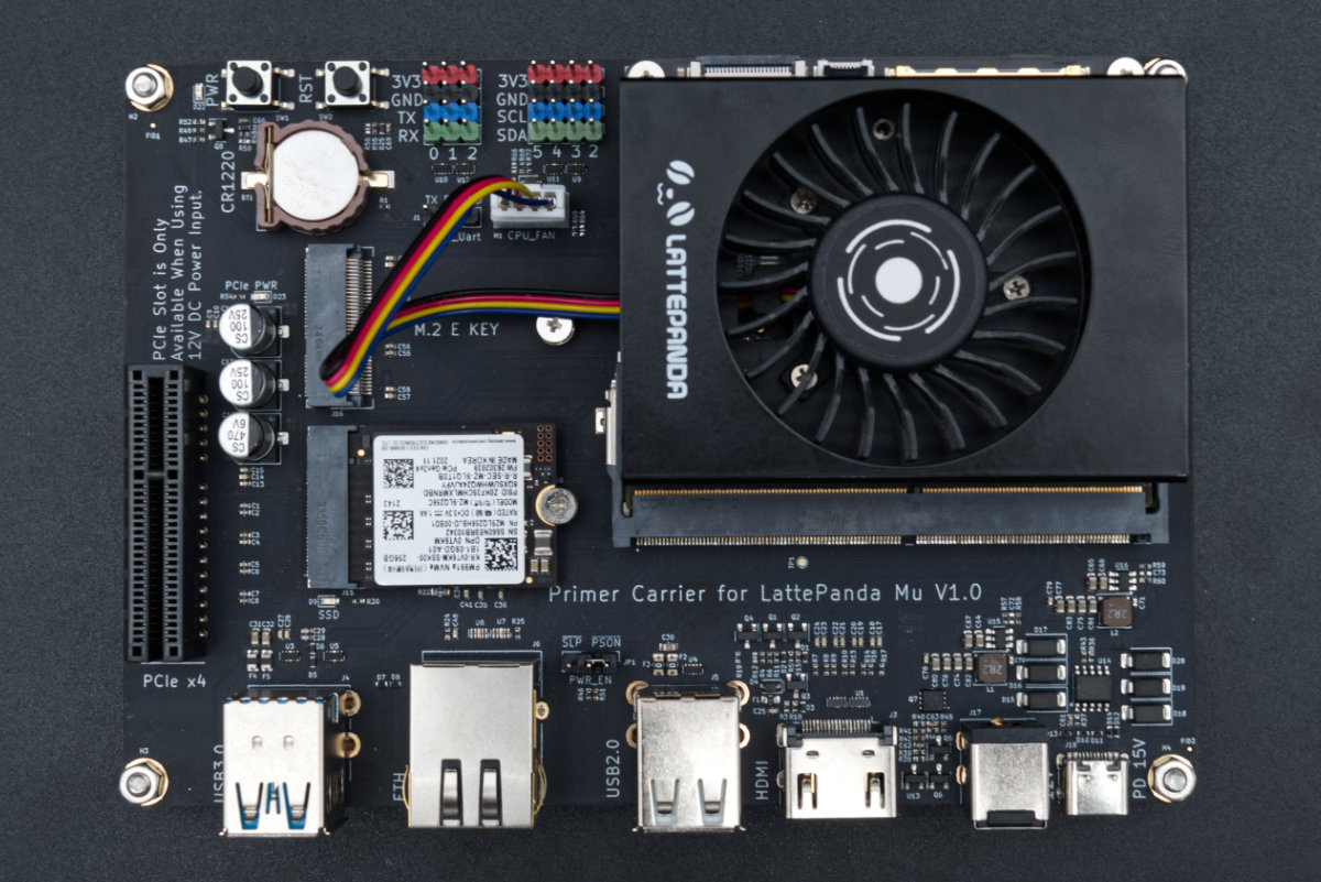 A top-down view of the module and the Lite Carrier board, showing pretty much every available connection. There's an NVMe SSD drive installed in one of the slots.