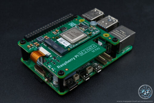 A photo showing the Raspberry Pi 5 with the AI Kit mounted on it.