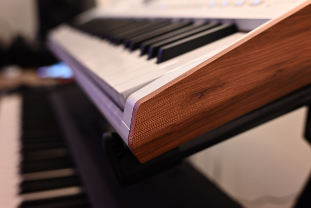 A side shot of the AstroLab, showcasing the wood side panels and lipped keytops.