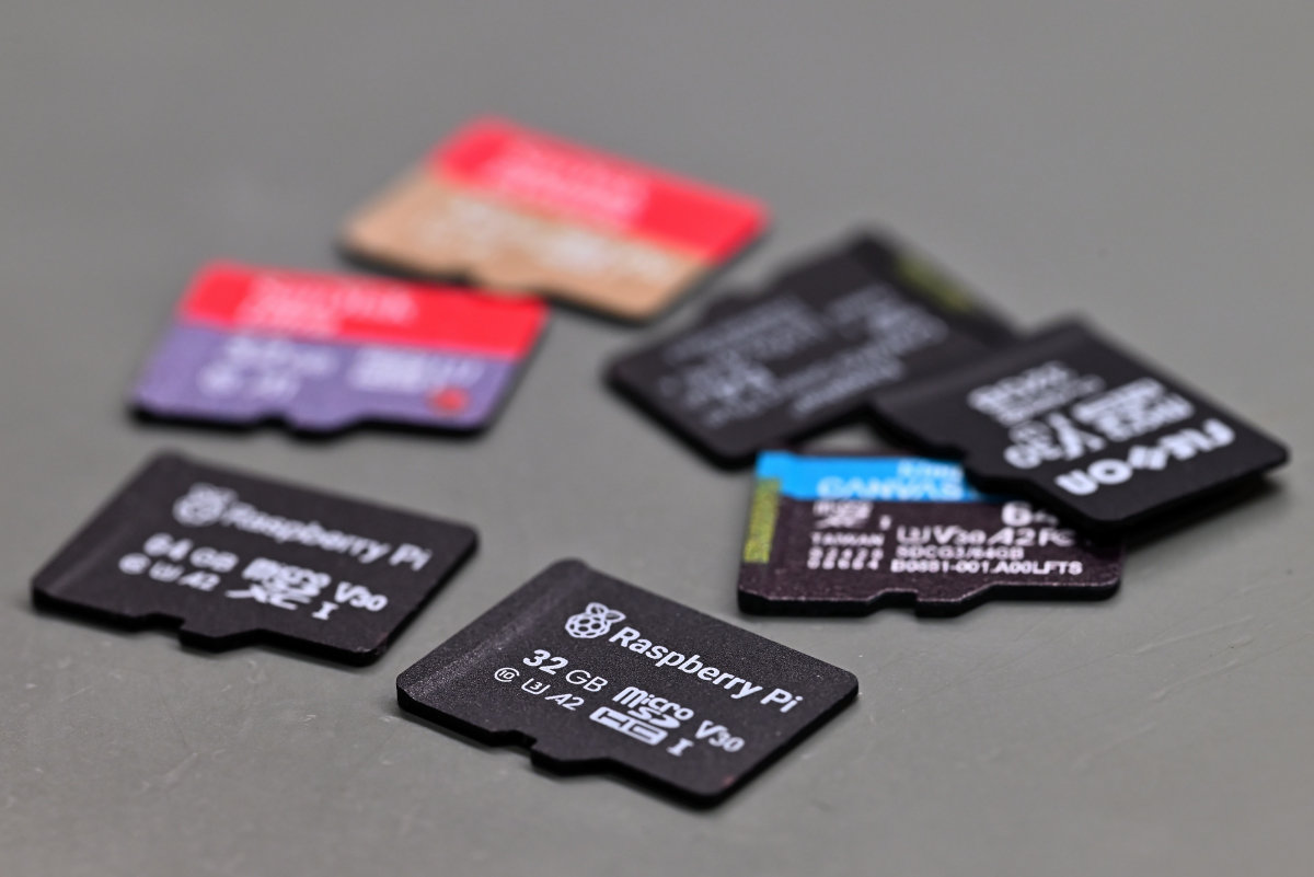 A photo showing a little pile of SD cards that are being used in this review, with the 32 GB Raspberry Pi SD card shown prominently.