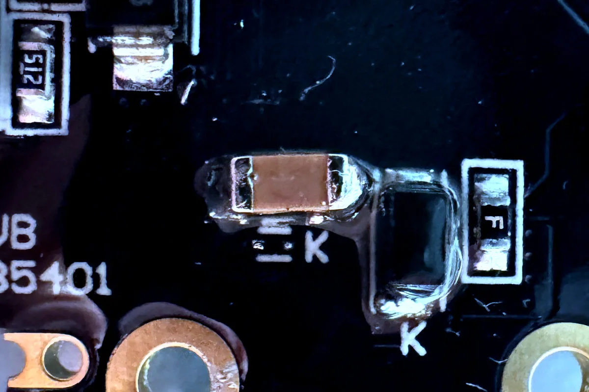 A photo showing a hand-soldered SMT component.