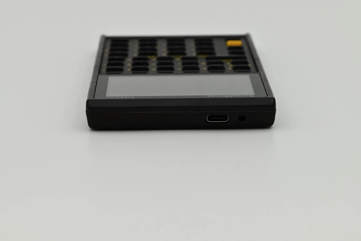 A photo showing the ports along the calculator's top side: a USB-C connector on the mid-right and an IR diode on the right.