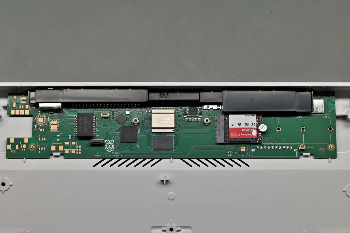 A top-down photo showing the Raspberry Pi 500+'s PCB.