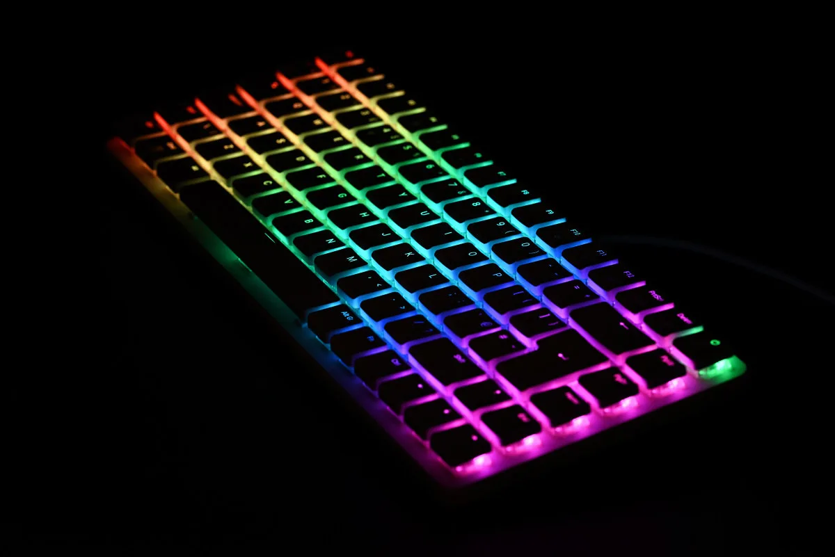 A photo showing the Raspberry pi 500+'s RGB lighting displaying a rainbow of colors.