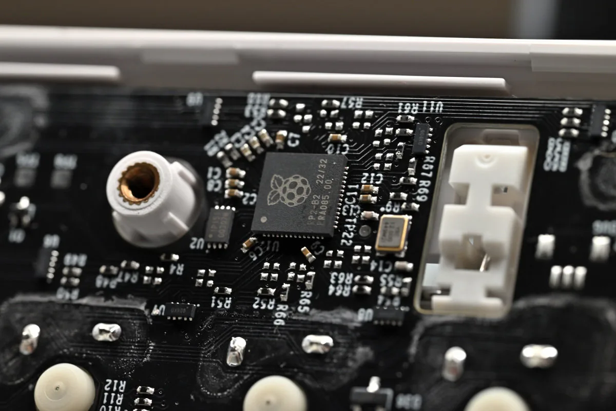 A close-up photo showing the RP2040 microcontroller that handles the keyboard inputs and lights.