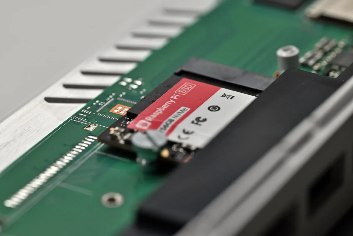 A close-up shot of the board's NVMe drive slot, with the included 256 GB drive installed.