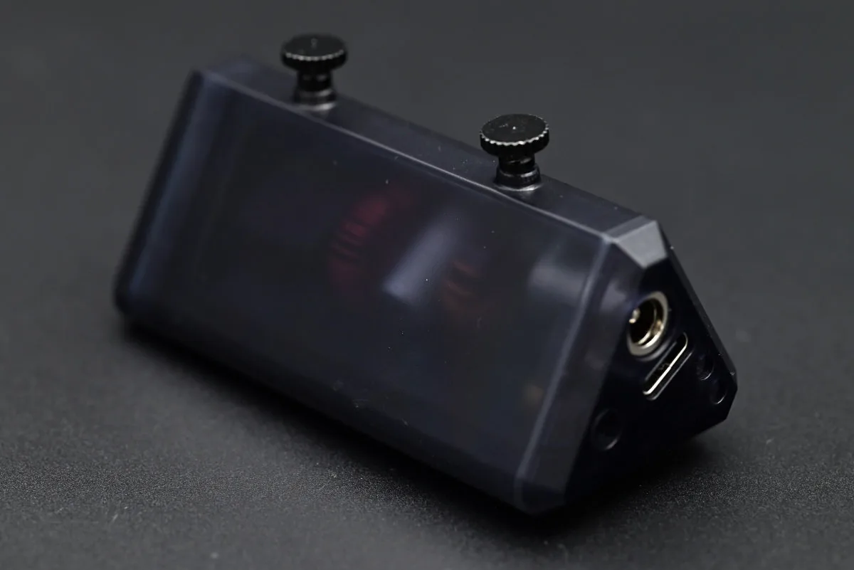 A photo showing through the translucent plastic enclosure of the TS1M, showing the internal components.