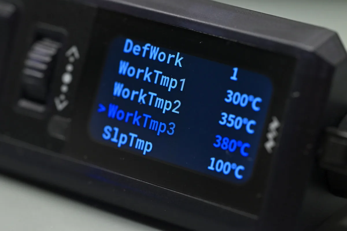 A photo of the screen showing a close-up of the settings interface, with temperature preset settings highlighted.