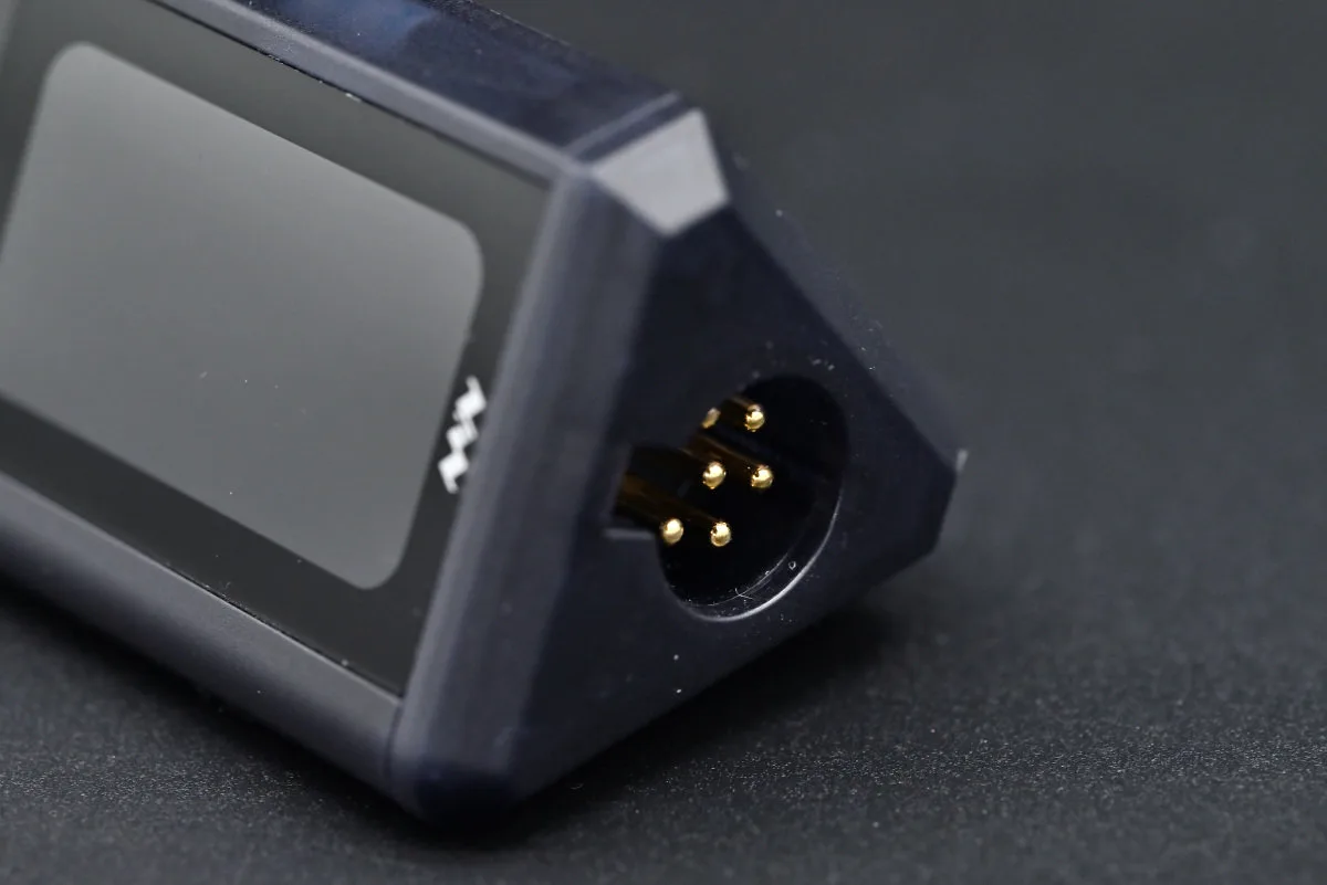 A close-up of the six-pin handle connector of the Miniware TS1M.