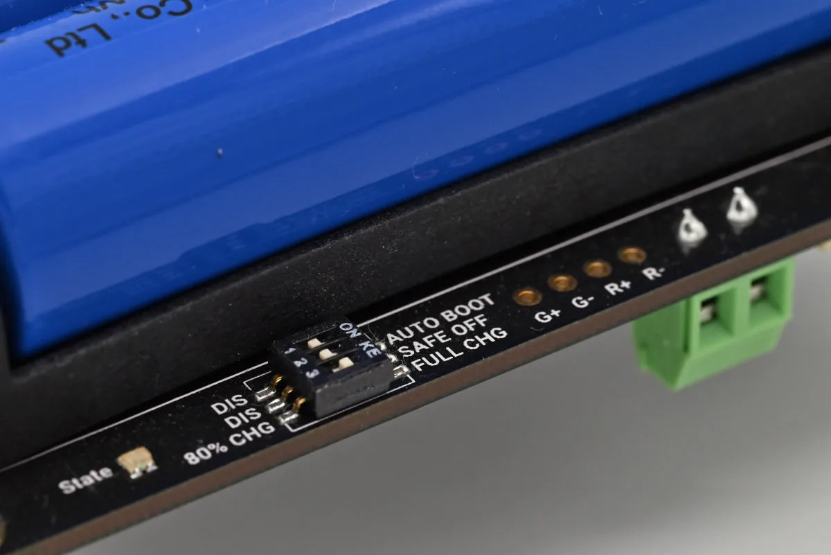 A photo of the power control triple DIP switch found on the UPS expansion board.