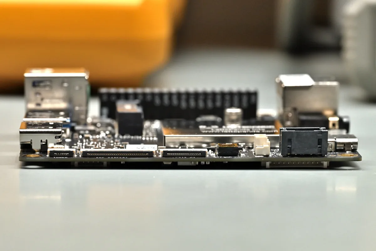 A photo of the IOTA's front edge, showing an array of ribbon and flat connectors.