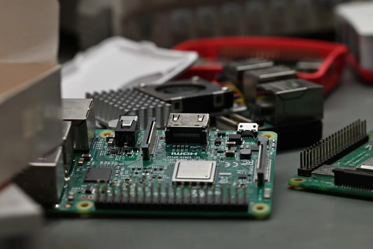A side view of the pile of Raspberry Pis - showing a Pi 3B prominently.