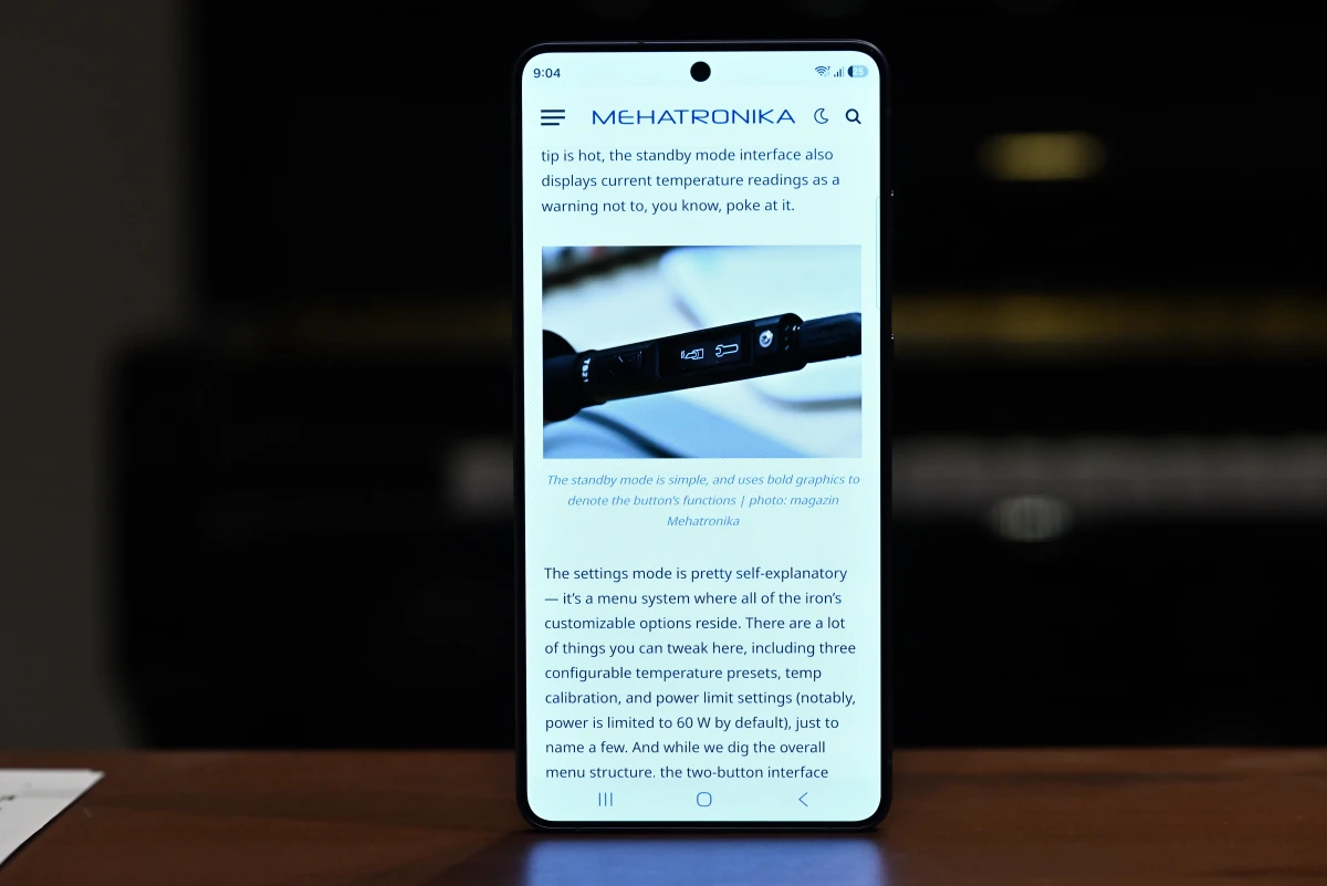 A photo of the S26 Ultra, head-on, with the screen on, in normal mode. The colors look accurate and bright, with the display legible.