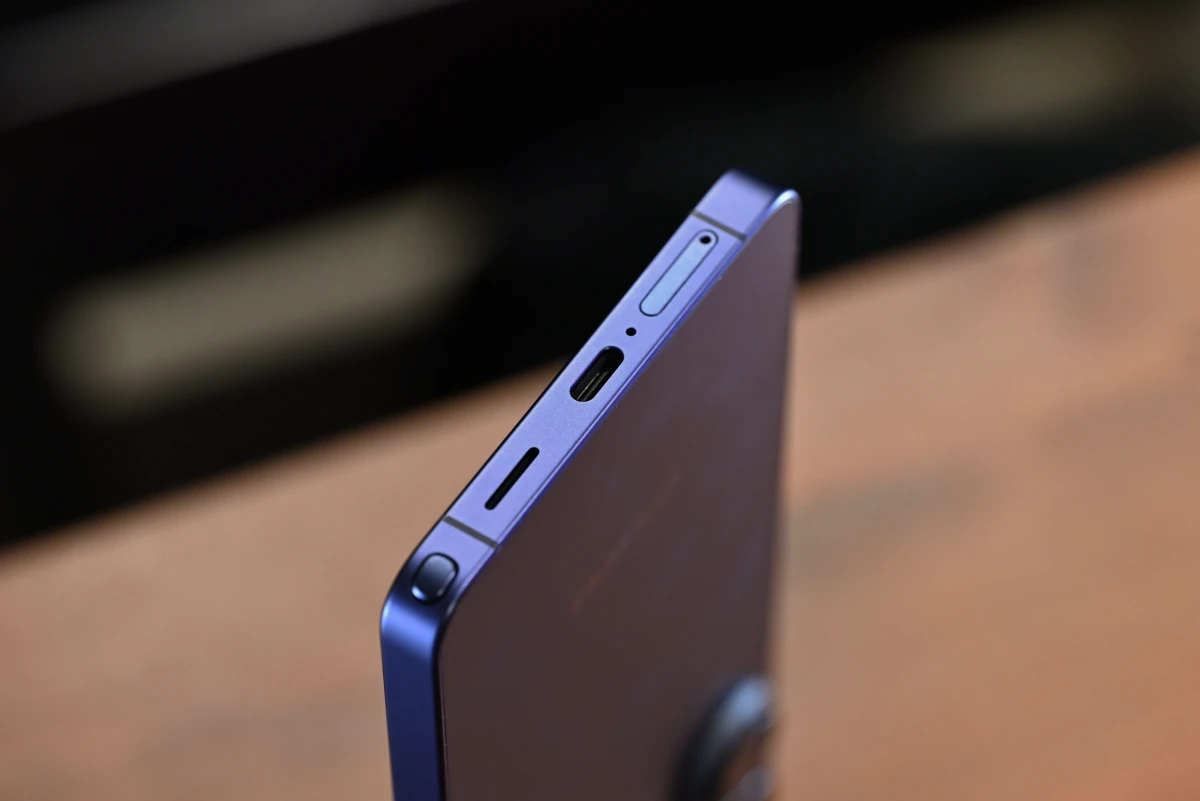 A photo of the S26 Ultra's USB port, SIM card tray, bottom-firing speaker, and S Pen slot.