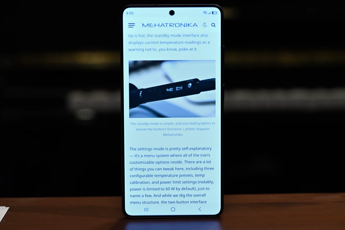 A photo of the screen at a head-pn angle, with maximum privacy mode of Privacy Display enabled. The colors are still relatively accurate, the display is legible, but contrast and brightness are diminished, especially noticeable in the blacks (text).